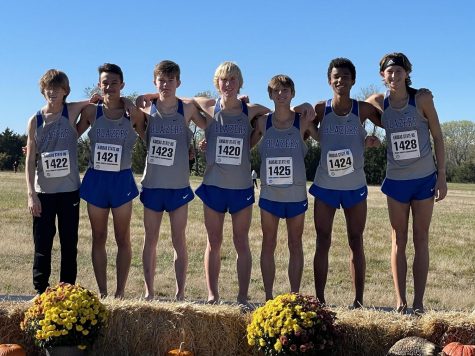 The Boys Cross Country team on the podium after getting 5th at state.