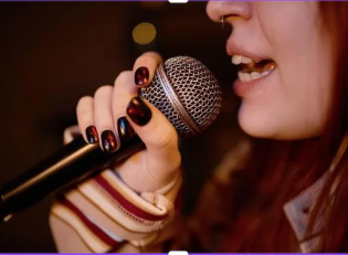 Performing and singing help student build confidence